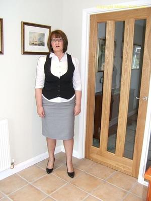 Kelly - black waistcoat, grey skirt