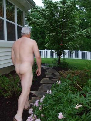 My wife and I naked outside our home