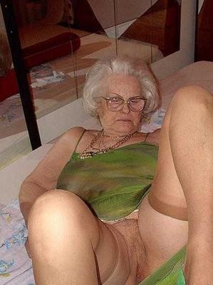 Older Granny showing tits and cunt